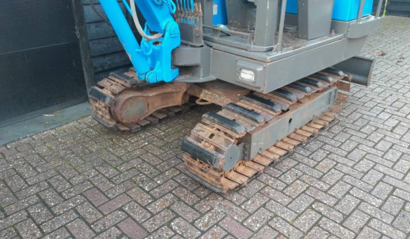 Yanmar YB 301 minigraver met CW05 en 3 bakken vol