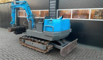 Yanmar YB 301 minigraver met CW05 en 3 bakken vol