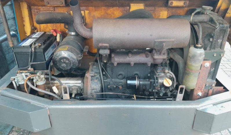Yanmar YB 301 minigraver met CW05 en 3 bakken vol