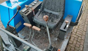 Yanmar YB 301 minigraver met CW05 en 3 bakken vol
