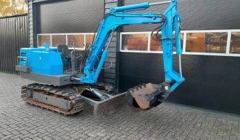 Yanmar YB 301 minigraver met CW05 en 3 bakken vol