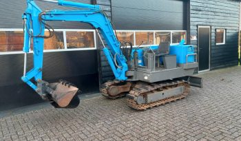 Yanmar YB 301 minigraver met CW05 en 3 bakken vol