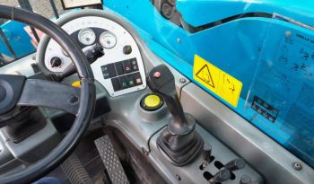 Genie GTH 4013 SX verreiker met bak en vorken vol