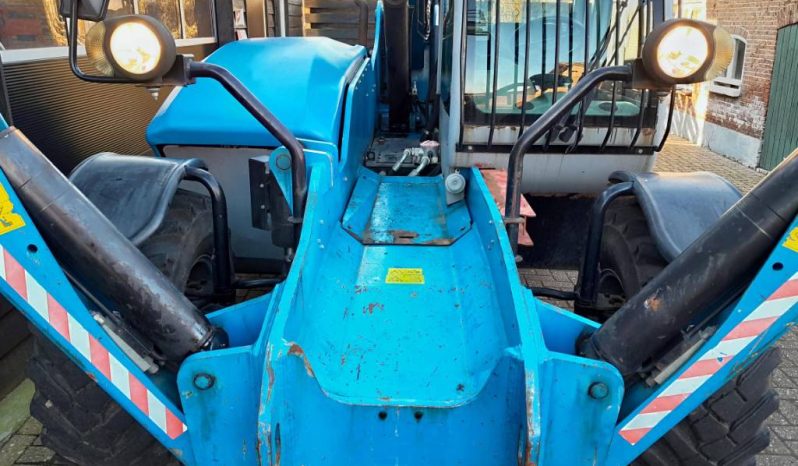 Genie GTH 4013 SX verreiker met bak en vorken vol