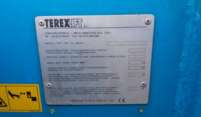 Genie GTH 4013 SX verreiker met bak en vorken vol