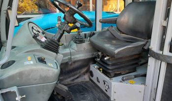 Genie GTH 4013 SX verreiker met bak en vorken vol