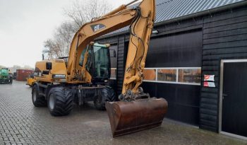 CAT M 313 C  graafmachine kraan vol