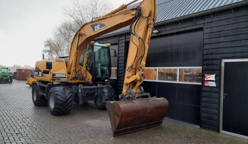 CAT M 313 C  graafmachine kraan vol