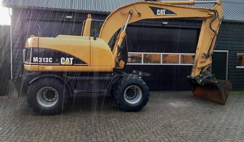 CAT M 313 C  graafmachine kraan vol