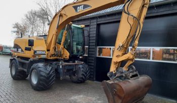 CAT M 313 C  graafmachine kraan vol