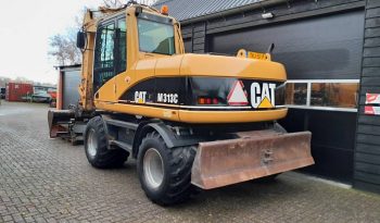 CAT M 313 C  graafmachine kraan vol
