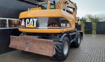 CAT M 313 C  graafmachine kraan vol
