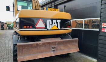 CAT M 313 C  graafmachine kraan vol