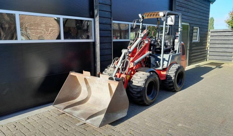 Weidemann 1250 cc 35 minishovel met bak en vorken vol