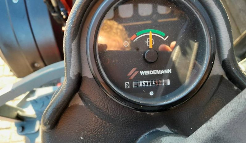 Weidemann 1250 cc 35 minishovel met bak en vorken vol