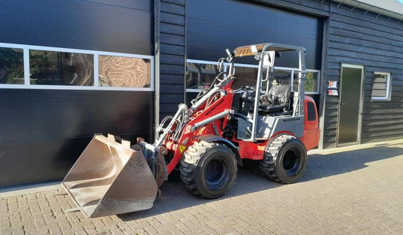Weidemann 1250 cc 35 minishovel met bak en vorken vol