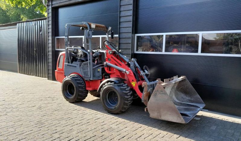 Weidemann 1250 cc 35 minishovel met bak en vorken vol