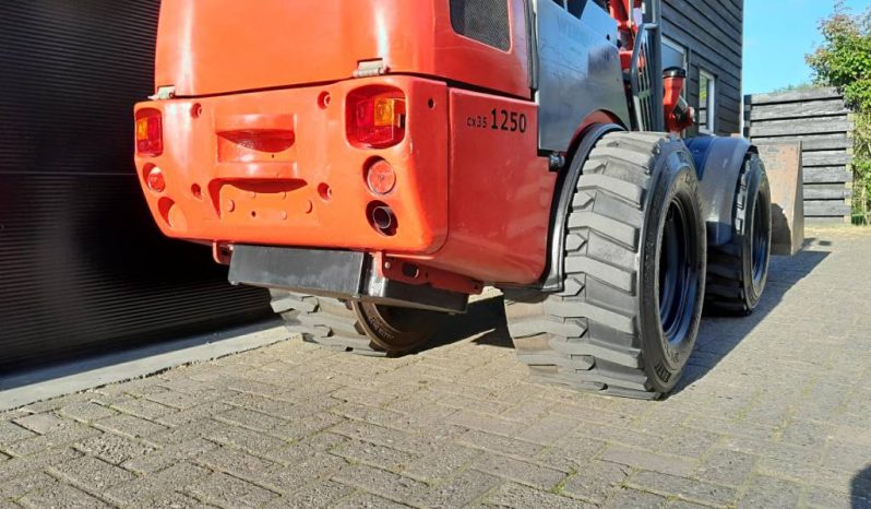 Weidemann 1250 cc 35 minishovel met bak en vorken vol