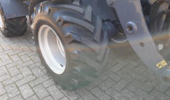 Eurotrac W13 shovel loader met bak en vorken vol