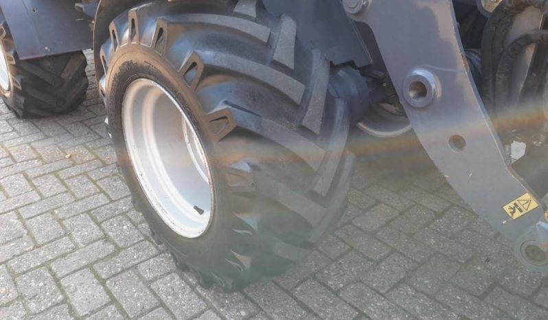 Eurotrac W13 shovel loader met bak en vorken vol