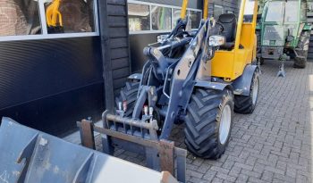 Eurotrac W13 shovel loader met bak en vorken vol