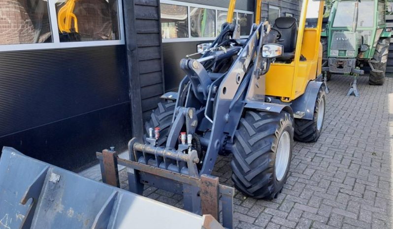 Eurotrac W13 shovel loader met bak en vorken vol