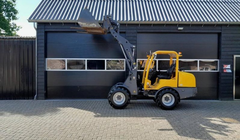 Eurotrac W13 shovel loader met bak en vorken vol