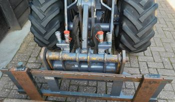 Eurotrac W13 shovel loader met bak en vorken vol