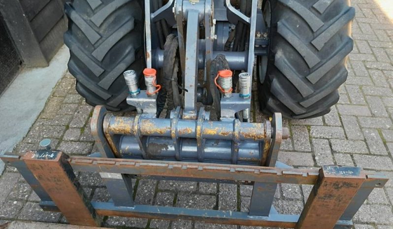 Eurotrac W13 shovel loader met bak en vorken vol
