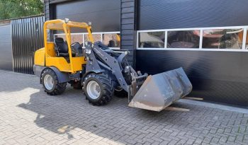 Eurotrac W13 shovel loader met bak en vorken vol