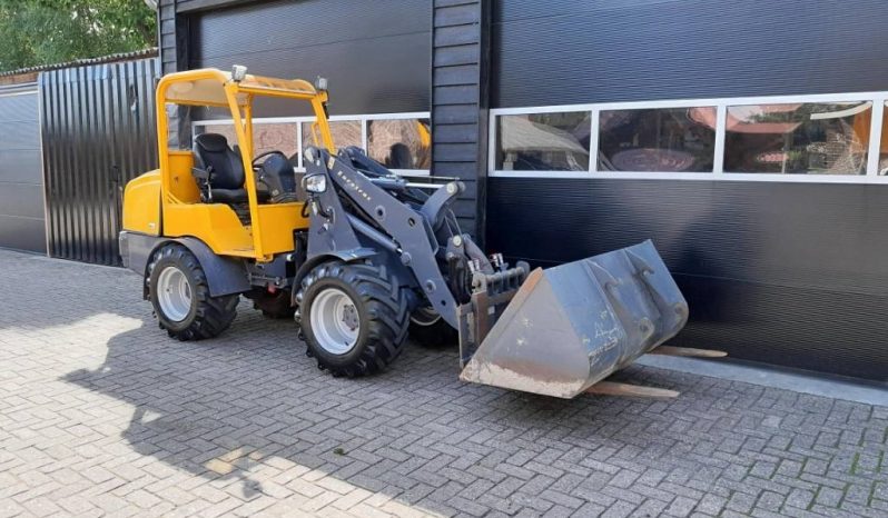 Eurotrac W13 shovel loader met bak en vorken vol