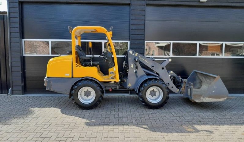 Eurotrac W13 shovel loader met bak en vorken vol