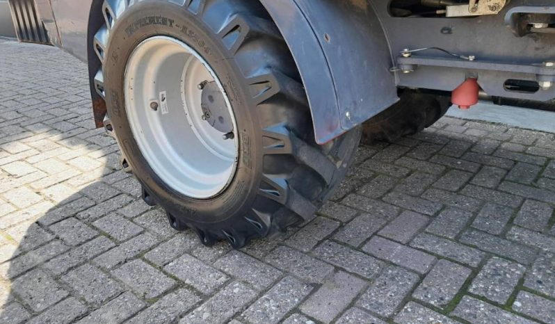 Eurotrac W13 shovel loader met bak en vorken vol