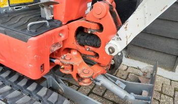Takeuchi TB 210 R minigraver met 3 bakken vol