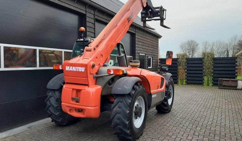 Manitou MT 932 verreiker met vorken vol