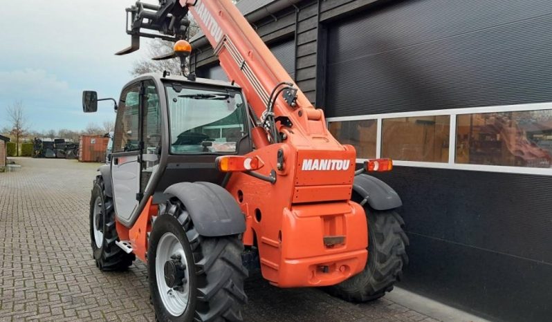 Manitou MT 932 verreiker met vorken vol