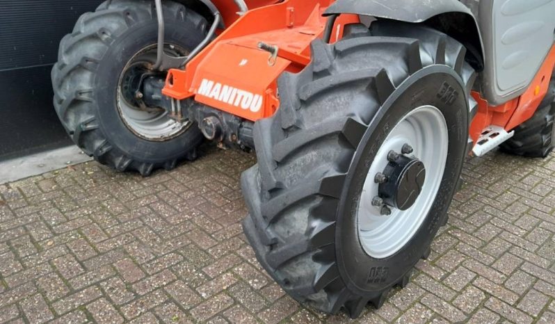 Manitou MT 932 verreiker met vorken vol