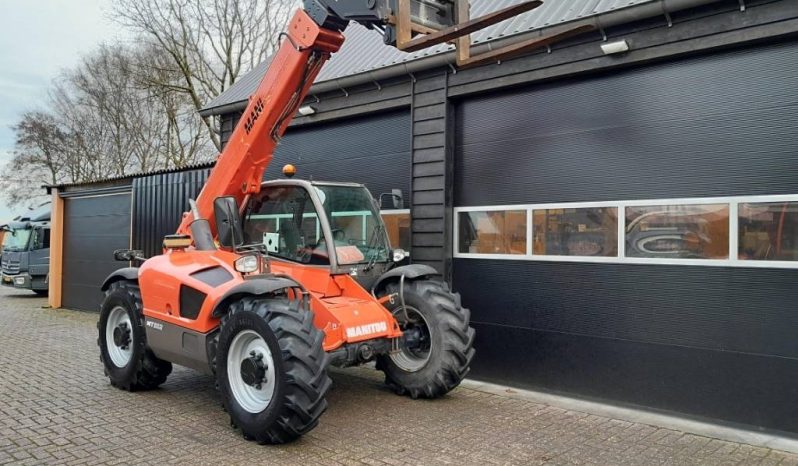 Manitou MT 932 verreiker met vorken vol