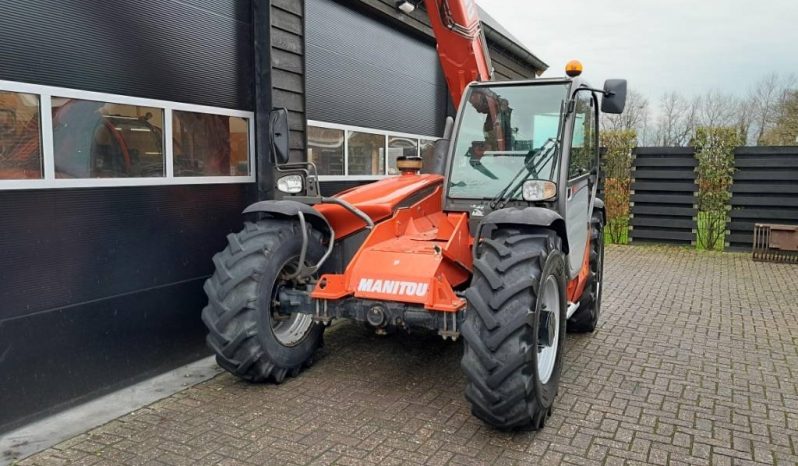 Manitou MT 932 verreiker met vorken vol