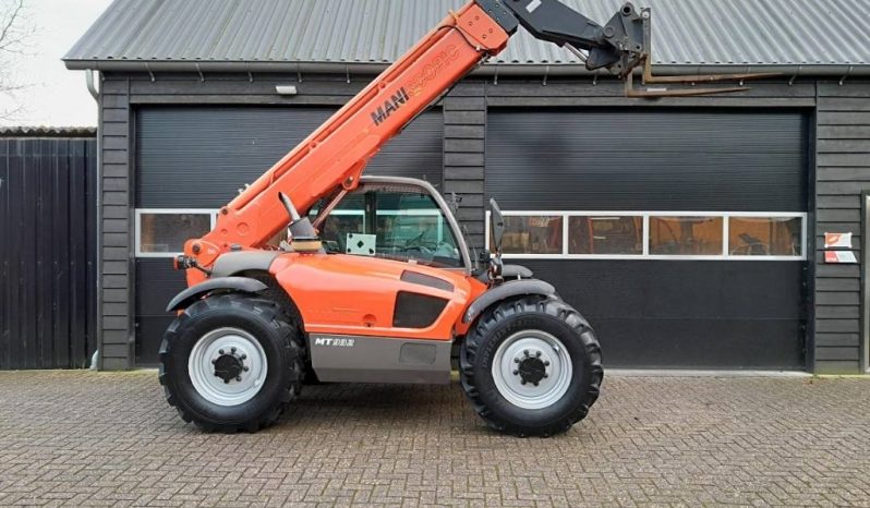 Manitou MT 932 verreiker met vorken vol