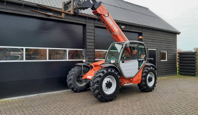 Manitou MT 932 verreiker met vorken vol