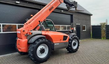 Manitou MT 932 verreiker met vorken vol