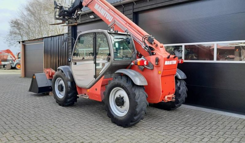 Manitou MT 1030 S verreiker – Grondbak + Vorken vol