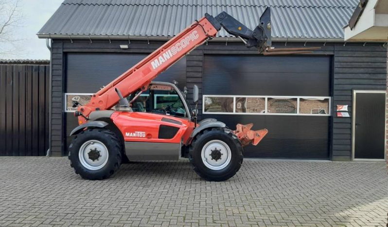 Manitou MT 1030 S verreiker – Grondbak + Vorken vol