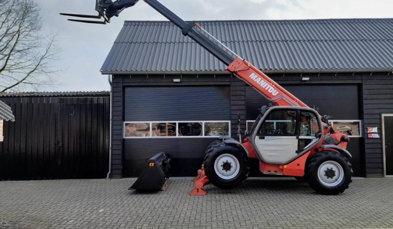 Manitou MT 1030 S verreiker – Grondbak + Vorken vol