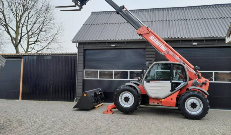 Manitou MT 1030 S verreiker – Grondbak + Vorken vol