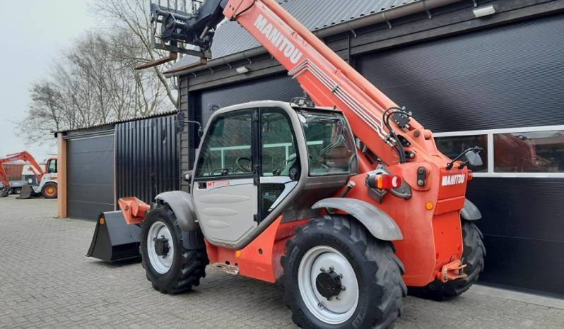 Manitou MT 1030 S verreiker – Grondbak + Vorken vol