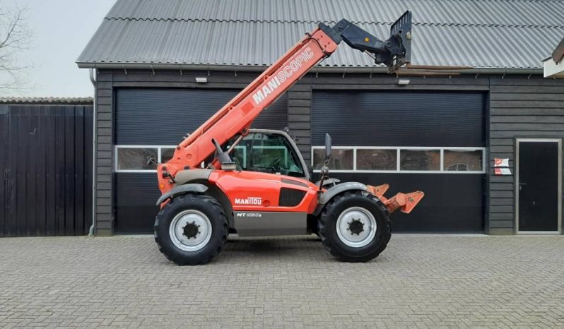 Manitou MT 1030 S verreiker – Grondbak + Vorken vol