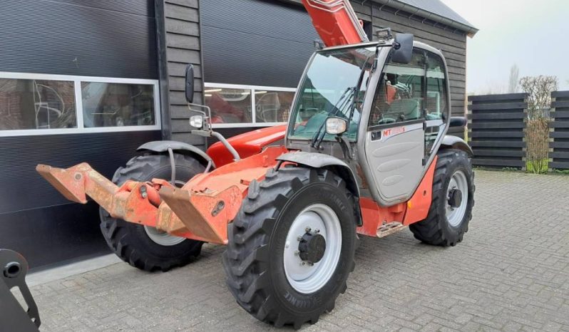 Manitou MT 1030 S verreiker – Grondbak + Vorken vol