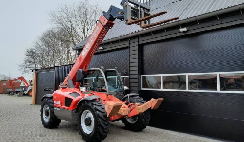 Manitou MT 1030 S verreiker – Grondbak + Vorken vol